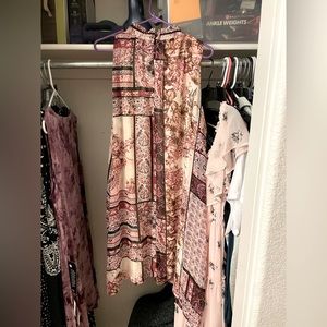 2 pink multi colored dresses.